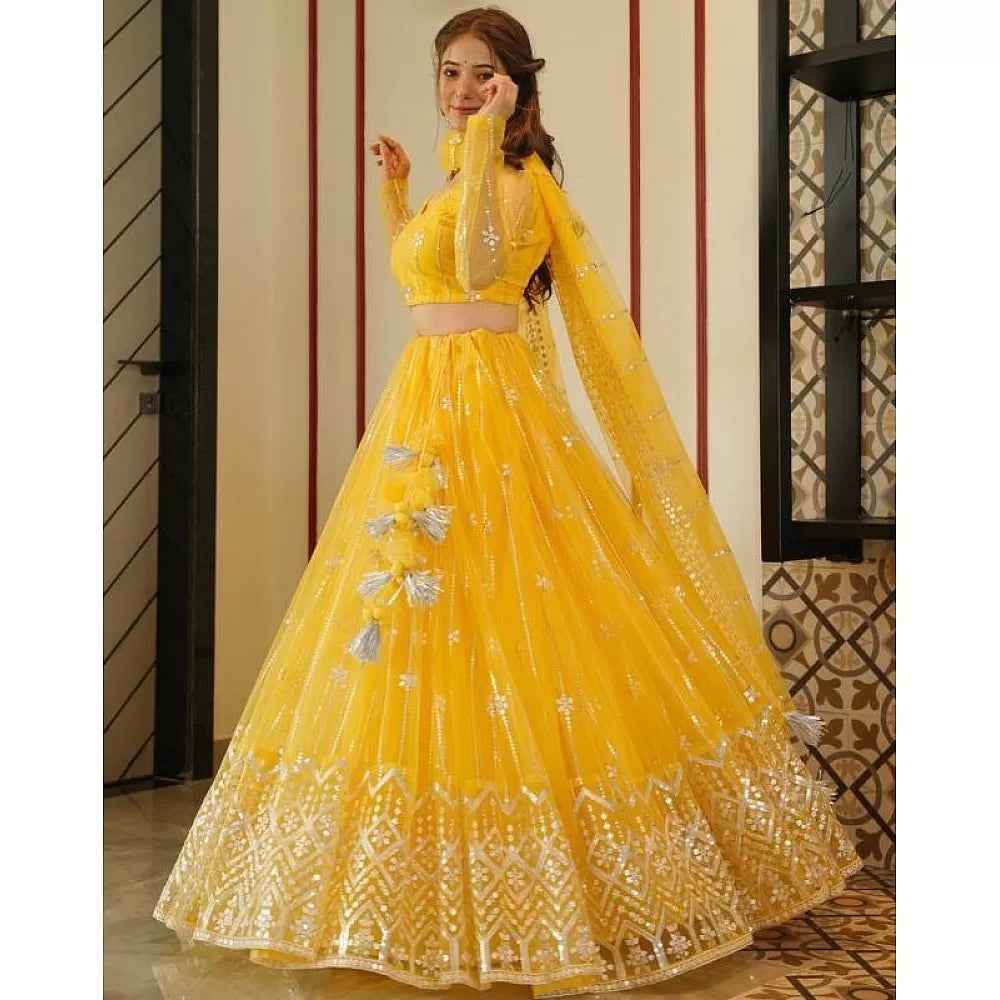 Yellow soft net sequence embroidery work haldi ceremony lehenga choli