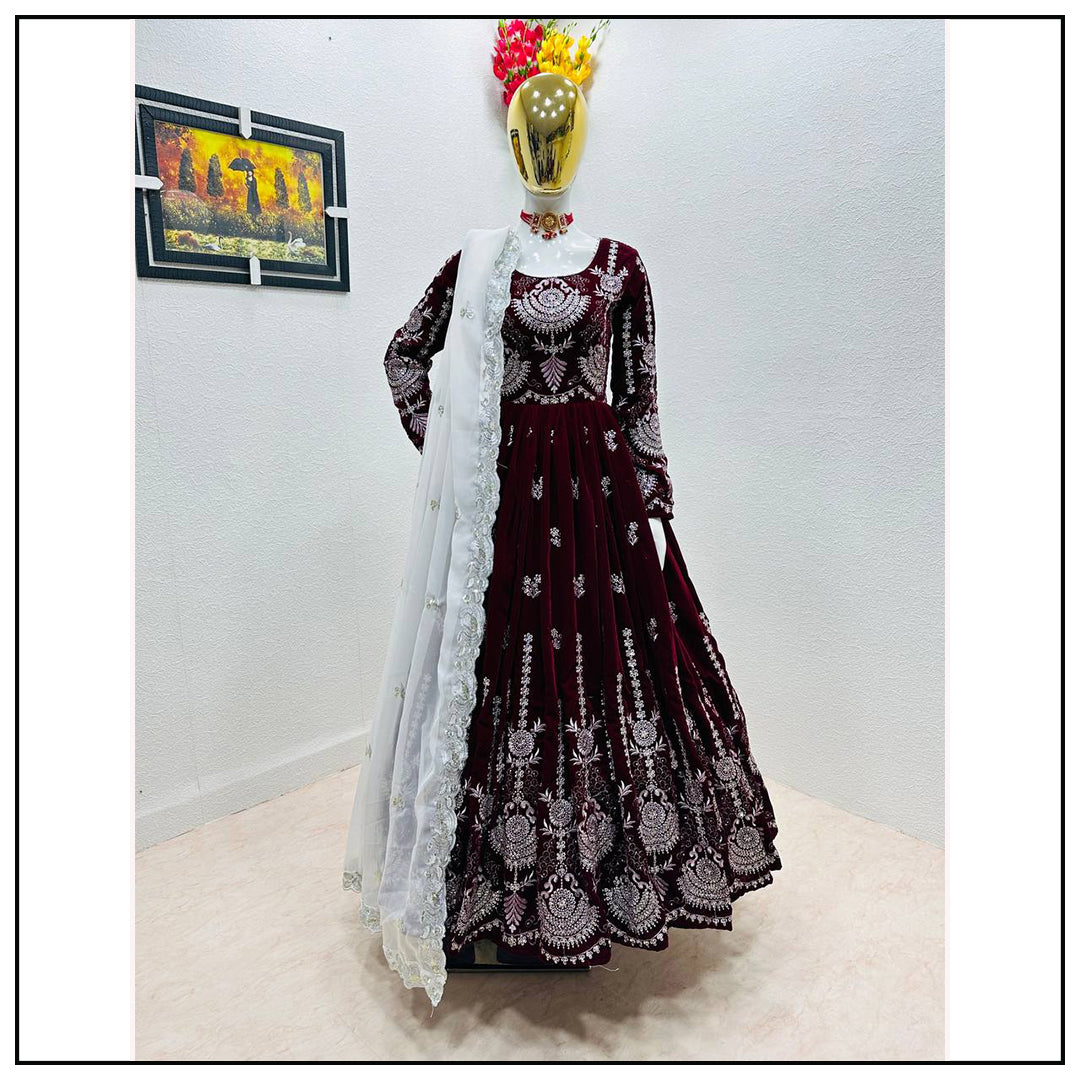 Maroon velvet heavy embroidery worked wedding gown